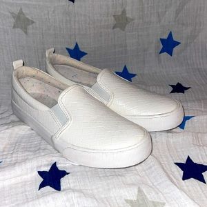 White, big girl size 4 white shoes. Never worn